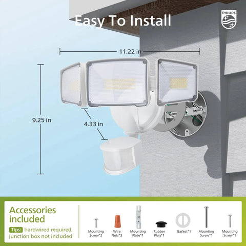 Lit 72W LED Security Flood Light With Motion Sensor, 7400 Lumen Aluminum Outdoor Light installed on a wall, showing three adjustable heads.