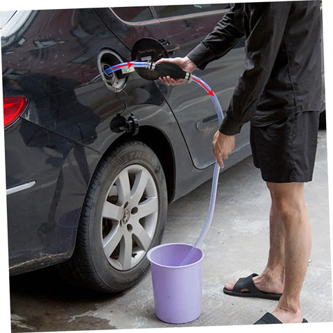 Manual Transfer Pump With One Way Siphon For Gas, Oil, Water And Fish Tank Liquids, Corrosion Resistant PVC Hand Pump, No Backflow, Easy Grab And Go Siphon For Cars, Motorcycles And Lawn Equipment used to transfer fuel from a car into a bucket