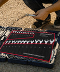Open 25-Piece Double Ended Wrench Set With Canvas Roll Bag In Beefy High Carbon Steel, displayed on a tool case for auto repair.