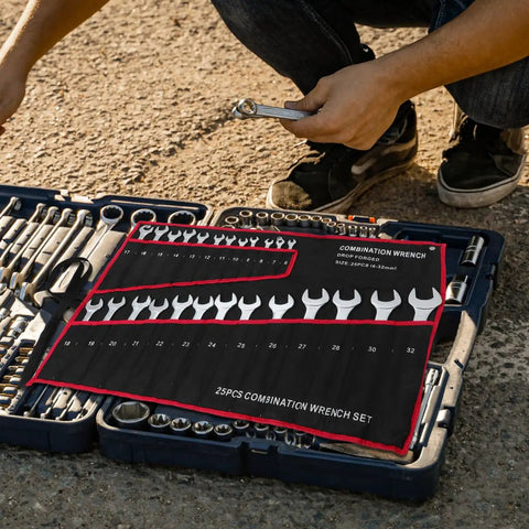 Open 25-Piece Double Ended Wrench Set With Canvas Roll Bag In Beefy High Carbon Steel, displayed on a tool case for auto repair.