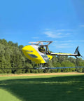 Ready To Fly Pro Grade RC Helicopter With Dual Brushless Motors Direct Drive 6CH flying in an outdoor field