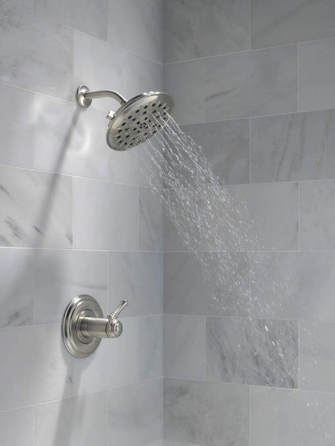 Brushed Nickel Four Setting Shower Head With H2Okinetic Spray Four Inch Round Design One Point Seven Five GPM Water Saving Flow