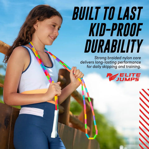 Girl holding Kid Friendly Beaded Jump Rope For Exercise Segmented Beaded Rope Shatterproof Durable Outdoor Rope.