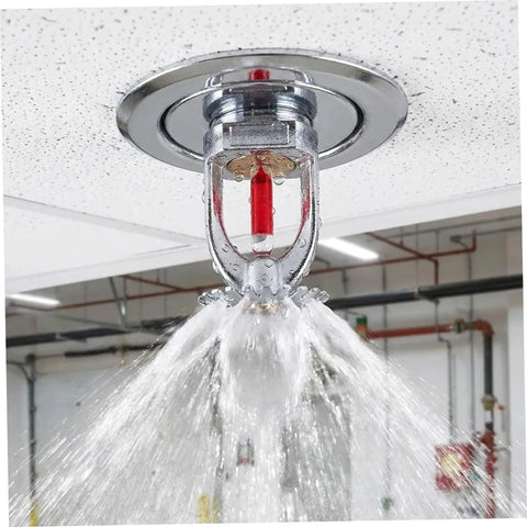 Top Notch 10 Pack Fire Sprinkler Heads Crafted From Heavy Duty Copper With Quick Response Activation At 155 Degrees Fahrenheit And Half Inch Thread Mount For Instant Downward Water Spray To Knock Back Flames Across Your Home Or Workshop Setup, showcasing water spray from a ceiling-mounted copper head.