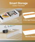 Smart storage features of a Compact Electric Standing Desk With Two Drawers 32x21 Inch Workstation C Clamp Mount Compatible Height Adjustable Sit Stand Desk Four Memory Height Settings Light Walnut Finish For Home Office showing two storage drawers and monitor stand.