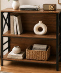 Slick Three Tier Industrial Bookshelf With Heavy Duty Metal Frame And Solid Back Panel, showcasing books and decorative items.