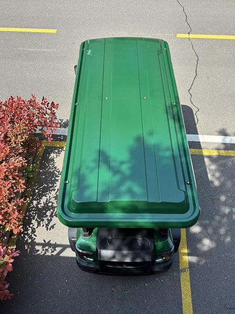 Four Seater Electric Golf Cart With Full Led Lighting And Tuned Independent Suspension Crafted For Chill Night Cruises Weekend Patrols Top Shelf Comfort And Sure Grip Tires In Green, top view on asphalt.