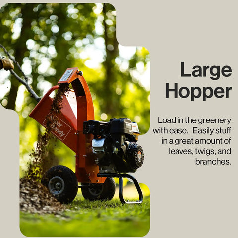 7 HP Mini Wood Chipper Shredder Mulcher for Yard Cleanup with extended chute, processing branches on grass background.