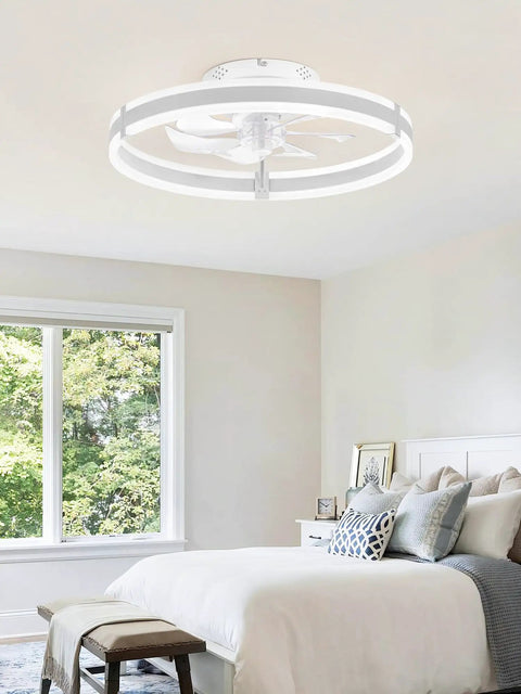 Slick Low Profile Ceiling Fan With Smart LED Light And Dual Remote And App Control small room cooler in a bright bedroom.