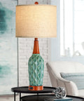 Vintage Ceramic Table Lamps Set Of 2 For Your Living Room And Bedroom Teal MCM Style Nightstand Lamps With USB Port 3 Way Dimmable Oatmeal Linen Shade Bulb Included, one lamp close-up on table