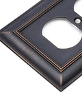 Decorative 1-Gang Duplex Wall Plate 3-Pack In Oil Rubbed Bronze Finish, close-up corner view showing zinc alloy detail