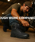 Man wearing Steel Toe Work Boots For Men And Women Slip Resistant Puncture Proof Safety Shoes Lightweight Comfort For All Day Wear ASTM F2413 18 Certified Durable Microfiber Upper Rugged Job Site Boots working on a motorcycle in a garage.
