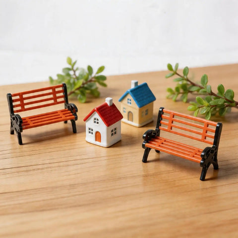 Two Pack 1 To 30 Scale Miniature Park Benches, In Classic Brown And Black Painted Finish, Realistic Tiny Garden Seats For Dollhouses, Model Train Layouts, And Outdoor Scene Decor, shown in a diorama setting with small houses and foliage.