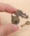 Close-up of Two Bear Shaped Antique Lock Buckle Hasps with Keys, iron dope decorative latch set, ideal for jewelry boxes