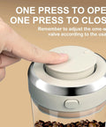 Hand pressing the one-way valve on the Big Capacity Airtight Coffee Bean Storage Jar With Date Tracker.