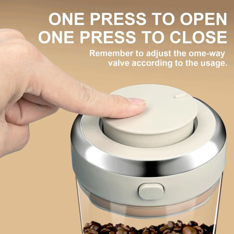Hand pressing the one-way valve on the Big Capacity Airtight Coffee Bean Storage Jar With Date Tracker.