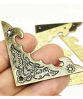 Close-up of Retro Vibe Iron Box Feet And Corner Brackets Set 200 Pcs 40mm Yellow Finish with antique detailing.