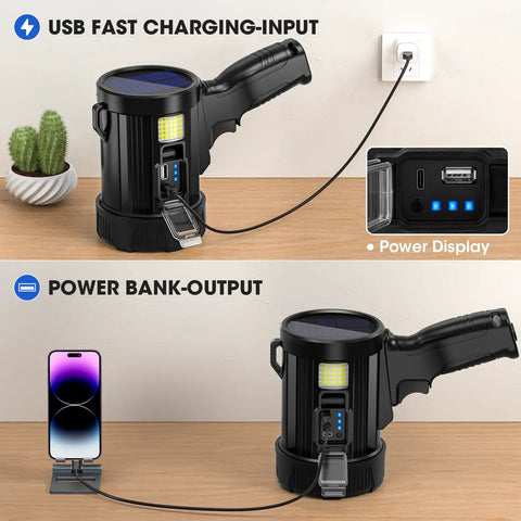 Rechargeable Spotlight 2,000,000 Lumens Handheld LED Flashlight with USB and solar charging next to smartphone on table
