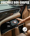 Person storing 12V Tire Inflator Portable Air Compressor With Display Gauge And LED Light in car glove box, compact design.