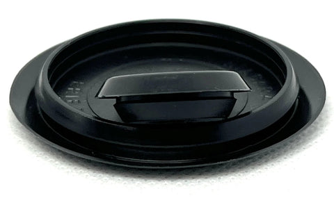 Close-up of a black plastic flush mount hole plug from a Fifty Piece Flush Mount Plastic Hole Plug Set For Auto Body And Sheet Metal