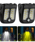 Small Solar Lights For Chain Link Fence With Motion Sensor Clip On Outdoor Lights For Garden Gate Deck Step Patio Camping Waterproof 2 Pack With 4 Light Modes showing front view and installed on fence.