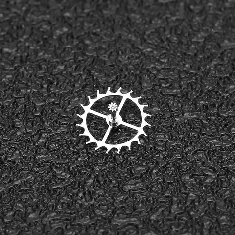 Escape Wheel Replacement Part for ETA 2824-2 2836-2 2834 Movements on textured surface, alloy material showing teeth detail