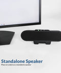 USB And Bluetooth Speaker Bar For PC With Built-In Speakerphone, Clamps To Monitors Up To 2 Inch Thick, on desk.