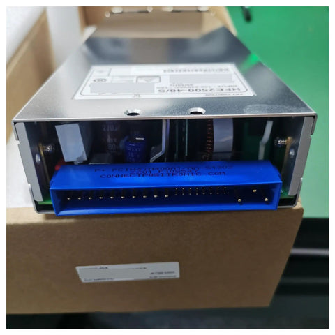 Rock Solid Compact Din Rail Power Supply For Industrial Automation And Communications Gear with blue connection port and metal casing.
