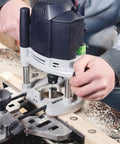 Using the Top Tier Half Inch Shank Carbon Steel Wood Dowel Plug Cutter on wood for precise pocket hole plugs.