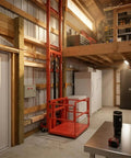 Must-Have Heavy Duty Freight Lift With 2200 Lbs Capacity Electric Cargo Elevator inside a warehouse setting.