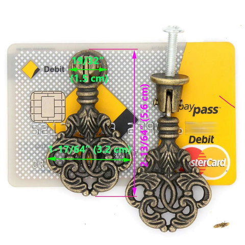 Vintage Pendant Pull Handles Set Of 4 In Distressed Antique Brass, zinc alloy pulls with entangled leaves, shown against credit card.