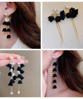 Black Acrylic Flower Bead Caps 100 Pcs Five Petal Frosted Resin Flower Spacers used in handmade drop earrings with pearls and chains.