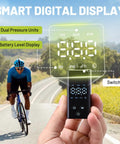 Hand holding Ultra Compact Mini Bike Pump With Gauge 120 PSI Electric Bike Pump with smart digital display.