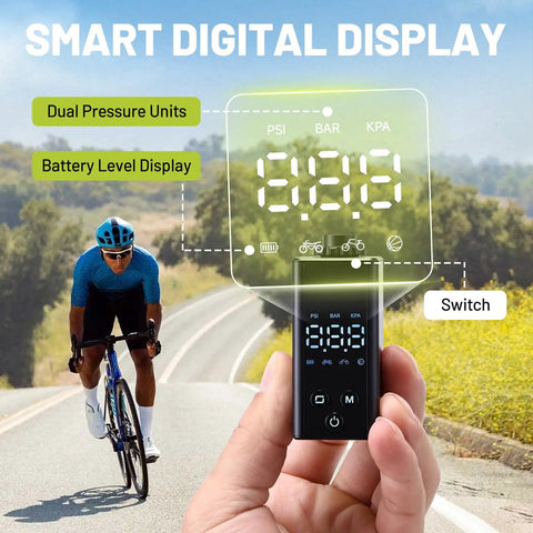 Hand holding Ultra Compact Mini Bike Pump With Gauge 120 PSI Electric Bike Pump with smart digital display.