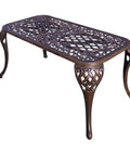 Mississippi Cast Aluminum Outdoor Cocktail Table 35 Inch Long By 18 Inch Wide In Antique Bronze, intricate leg design, top view