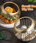 Two gold metal baskets, one with citrus and grapes, other with coffee pods, illustrate Large Capacity Coffee Pod Holder For Countertop Holds 30 Plus K Cups And Keurig Pods Metal Coffee Capsule Storage Organizer For Any Capsule Home Office Kitchen Countertop Organizer Gold Finish usage.