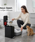 Woman using 3 Gallon 12 Liter Dog Poop Trash Can With Lid And AbsorbX Odor Filter For Outdoor Use Rust Proof Matte Black Stainless Steel Pet Waste Bin With Soft Close Step Pedal For Backyard Bathroom And Office in bathroom.