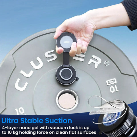 MagSafe Car Phone Holder With All Metal Aluminum Alloy Build 360 Degree Rotating Tough As Nails Yet Sleek Ultra Stable Suction Cup next to weight plate.