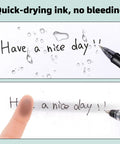 "Have a nice day" written with Bulk Gel Pens 0.7mm Retractable Black Ink Set showing no smudge under water droplets
