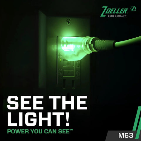M63 Automatic Submersible Sump Pump With 3/10 HP Cast Iron Housing LED power plug glowing in a dark room
