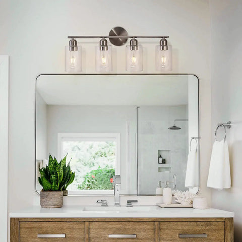 Four Light Bathroom Vanity Light Fixture In Brushed Nickel Finish With Clear Glass Shades Wall Mount Over Mirror Hardwired Easy Install And Up Or Down Mount For A Fresh Modern Look