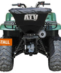Rear view of ATV with Beefy ATV Broadcast Spreader With Rain Cover, 100 Pound Capacity Poly Hopper, Rear Rack Mount installed.