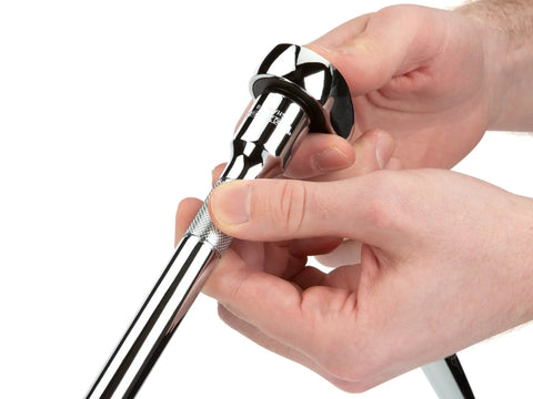 Hands adjusting a ratchet from the Half Inch Drive Socket Set With Deep And Shallow 6 Point Sockets, Ratchet And Beefy Case, 83-Piece
