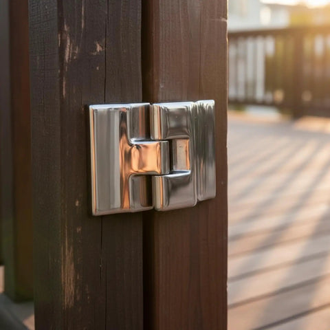 316 Stainless Steel Heavy Duty Hinge With Broad Mounting Plates Polished Finish For Sunroom Roofs Rv Campers Marine Builds Home Reno installed on wooden post.