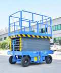 Heavy Duty Electric Scissor Lift Platform Featuring Smooth Hydraulic Action For Mobile Warehouse Cargo Hoisting And Adjustable Height with safety guardrails.
