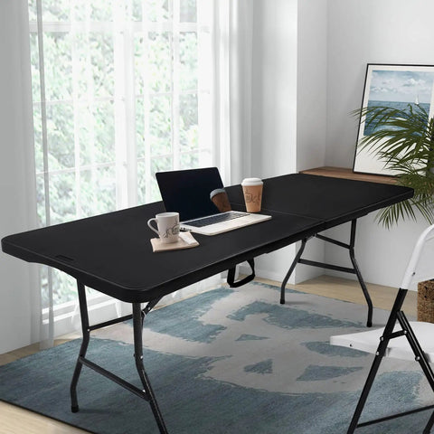 Foldable 6 Foot HDPE Table Go To Portable Banquet Surface Fold In Half Desk Utility For Working Meetings Parties Picnics Camping Weddings Catering Garden Dining Black set up in an office with chairs and laptop