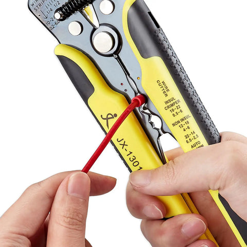 Close-up of Automatic Wire Stripper Tool 8 Inch Self Adjusting With Replaceable Springs stripping an electrical wire.