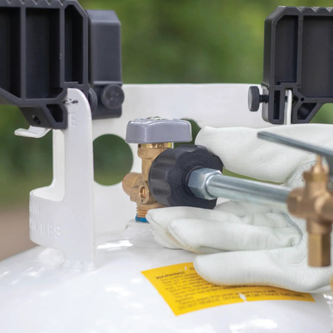 Close-up of One Pound Propane Refill Kit for Refillable Tank No Fuss Fast Sixty Second Refill with stabilizing feet attached to propane tank.