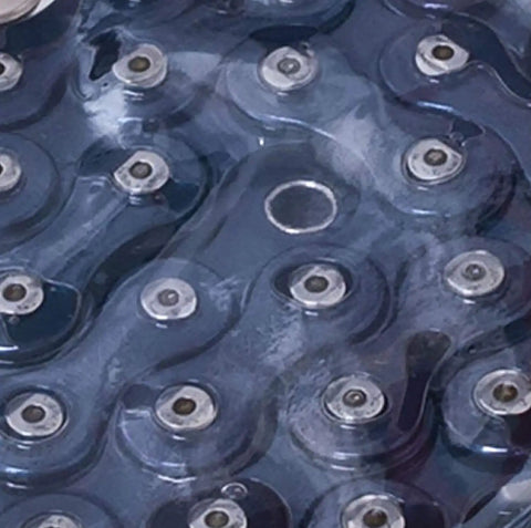 Close-up of Vertex Track Racer Chain NJS Certified One Half By One Eighth Inch Pitch BMX Racing Chain with 106 links