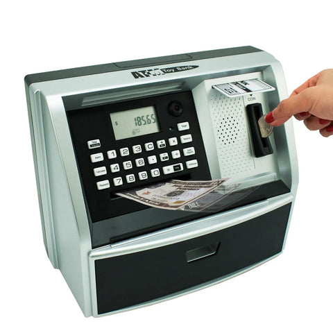Hand inserting coin into Kid Friendly ATM Piggy Bank With Electronic Coin Counter Card And Password Mini ATM Machine For Kids